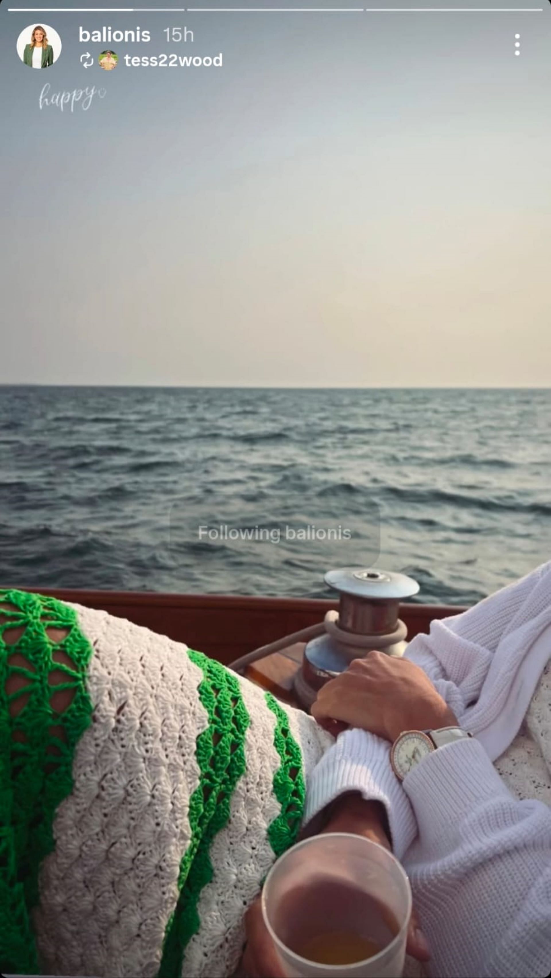 Amanda Balionis re-shares a boat day photo in a white and green crochet dress (via @balionis)